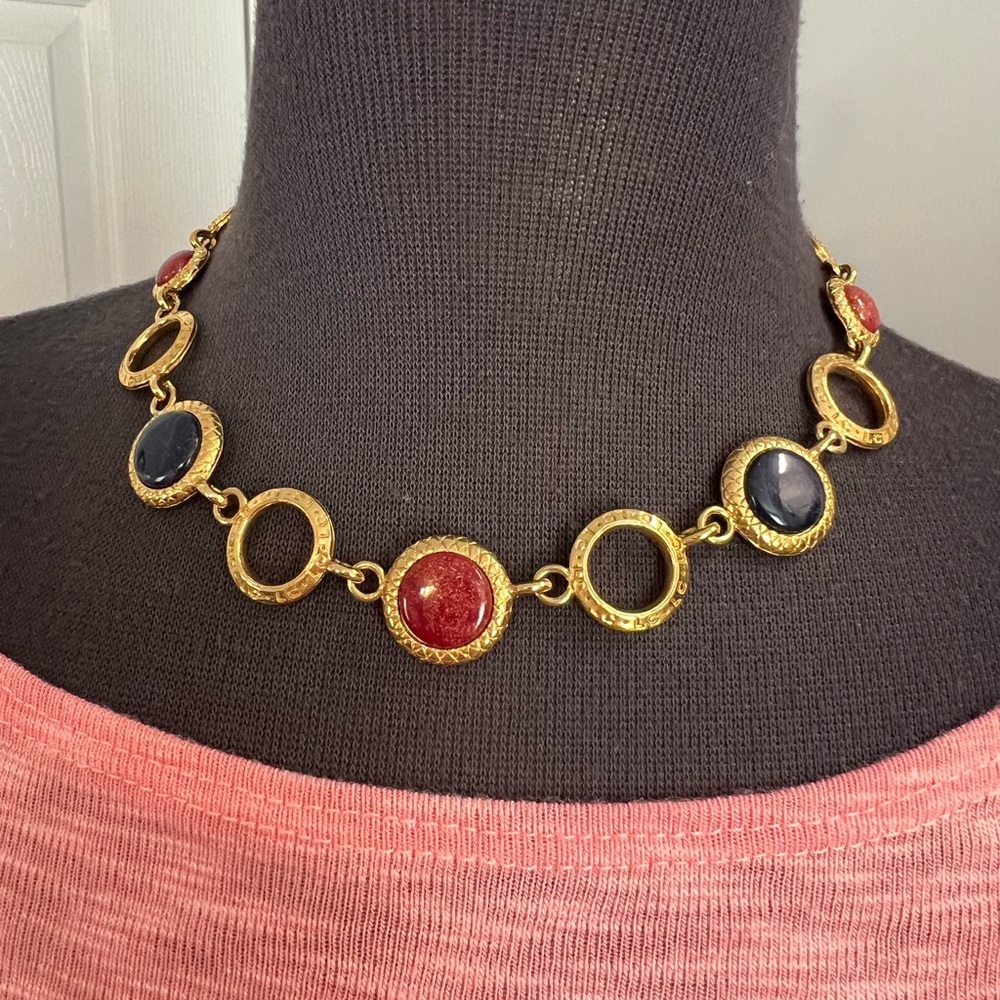 LC Liz Claiborne gold fashion necklace with navy and burgundy stones.